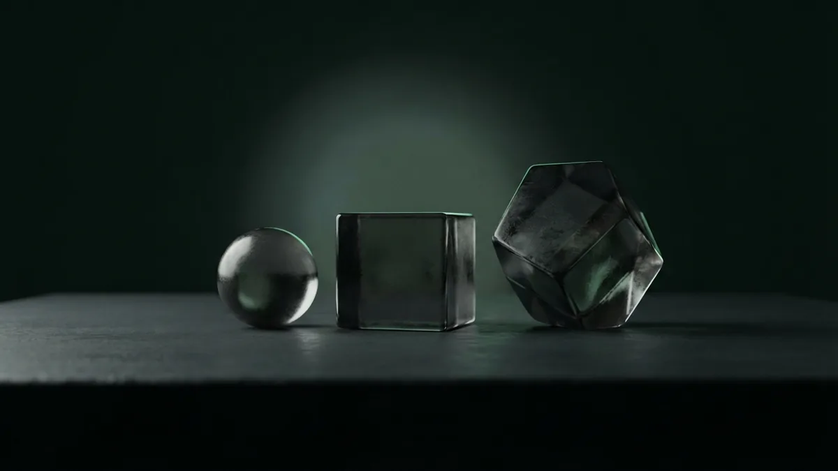 Three distinct dark glass forms arranged for a calm comparison in a green-black studio